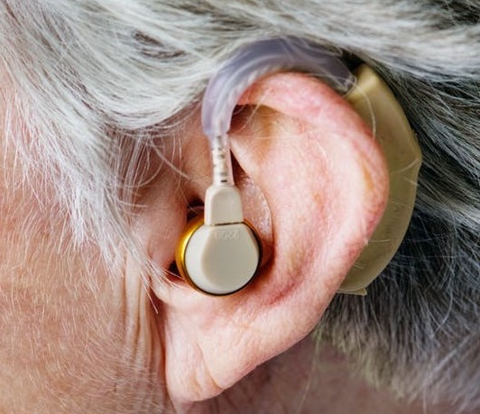 person wearing hearing aid